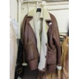 A First Cover real sheepskin jacket along with a knitted jacket