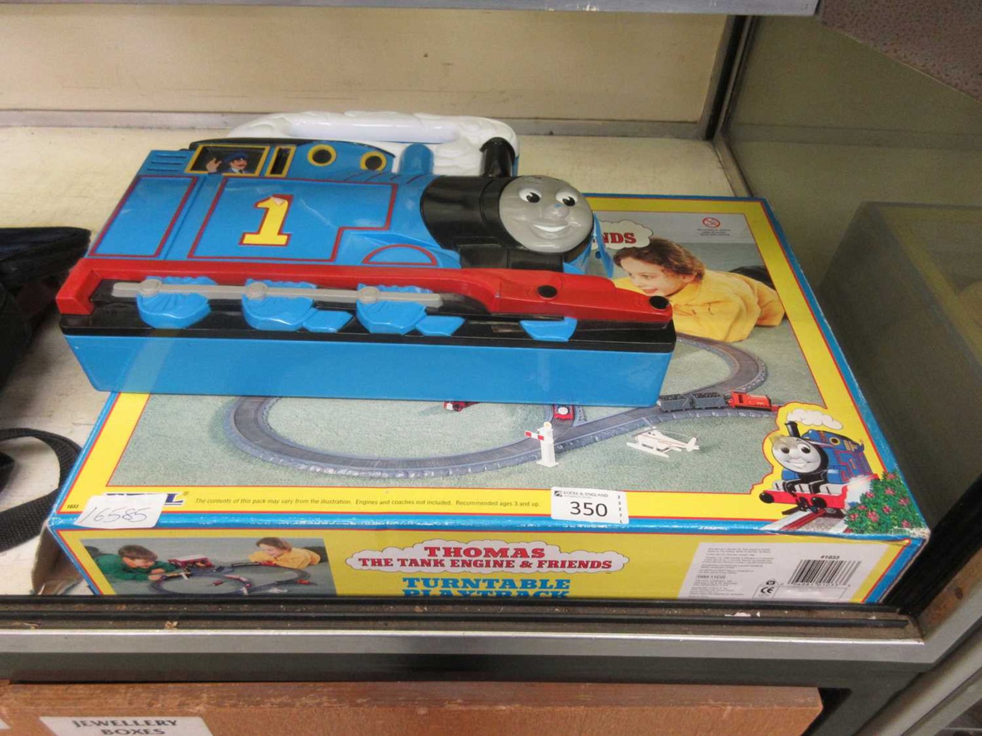 A boxed Thomas The Tank Engine and friends turntable play track along with Thomas carry case with