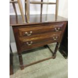 A reproduction oak 18th century style two drawer side table