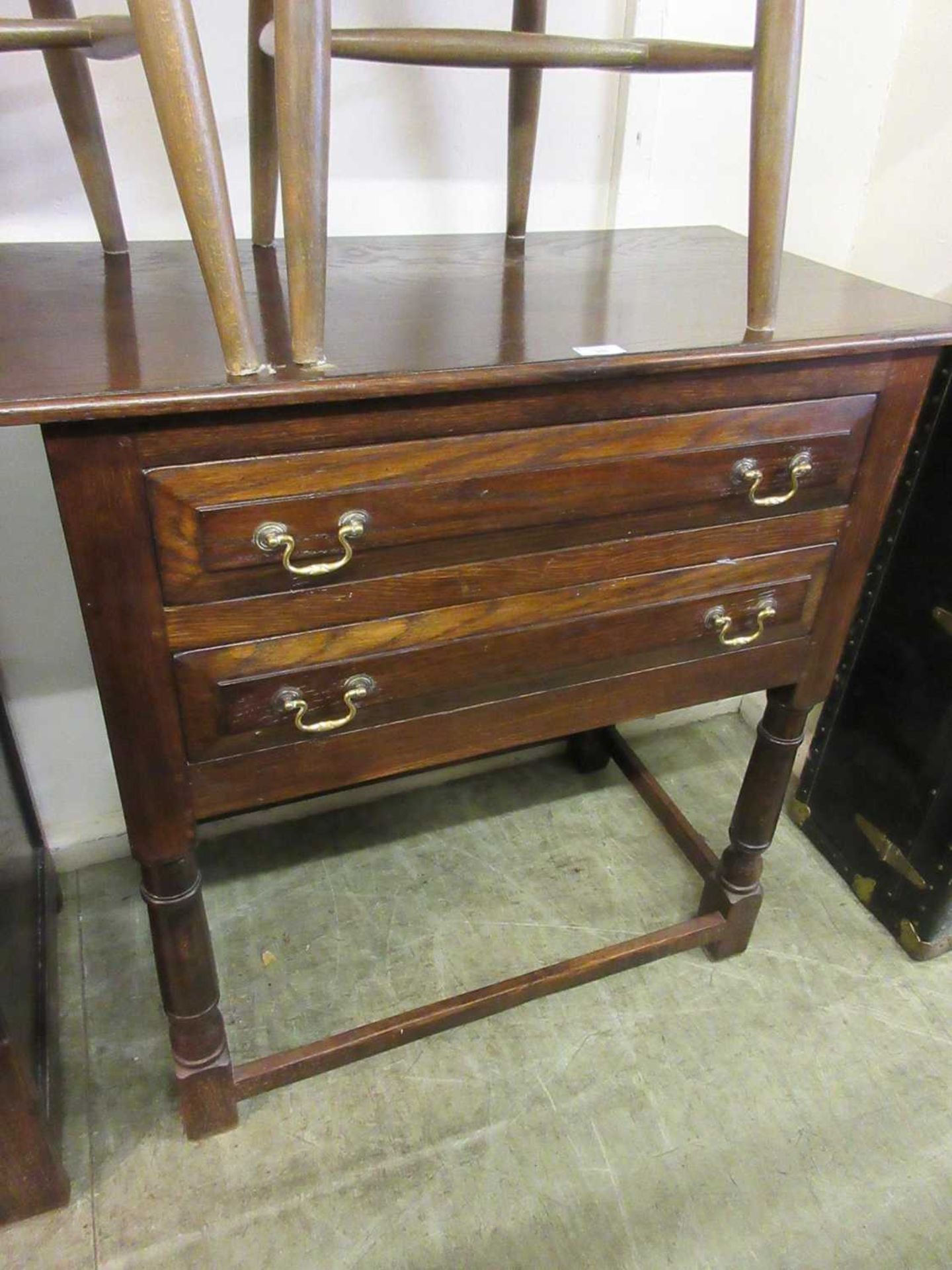 A reproduction oak 18th century style two drawer side table