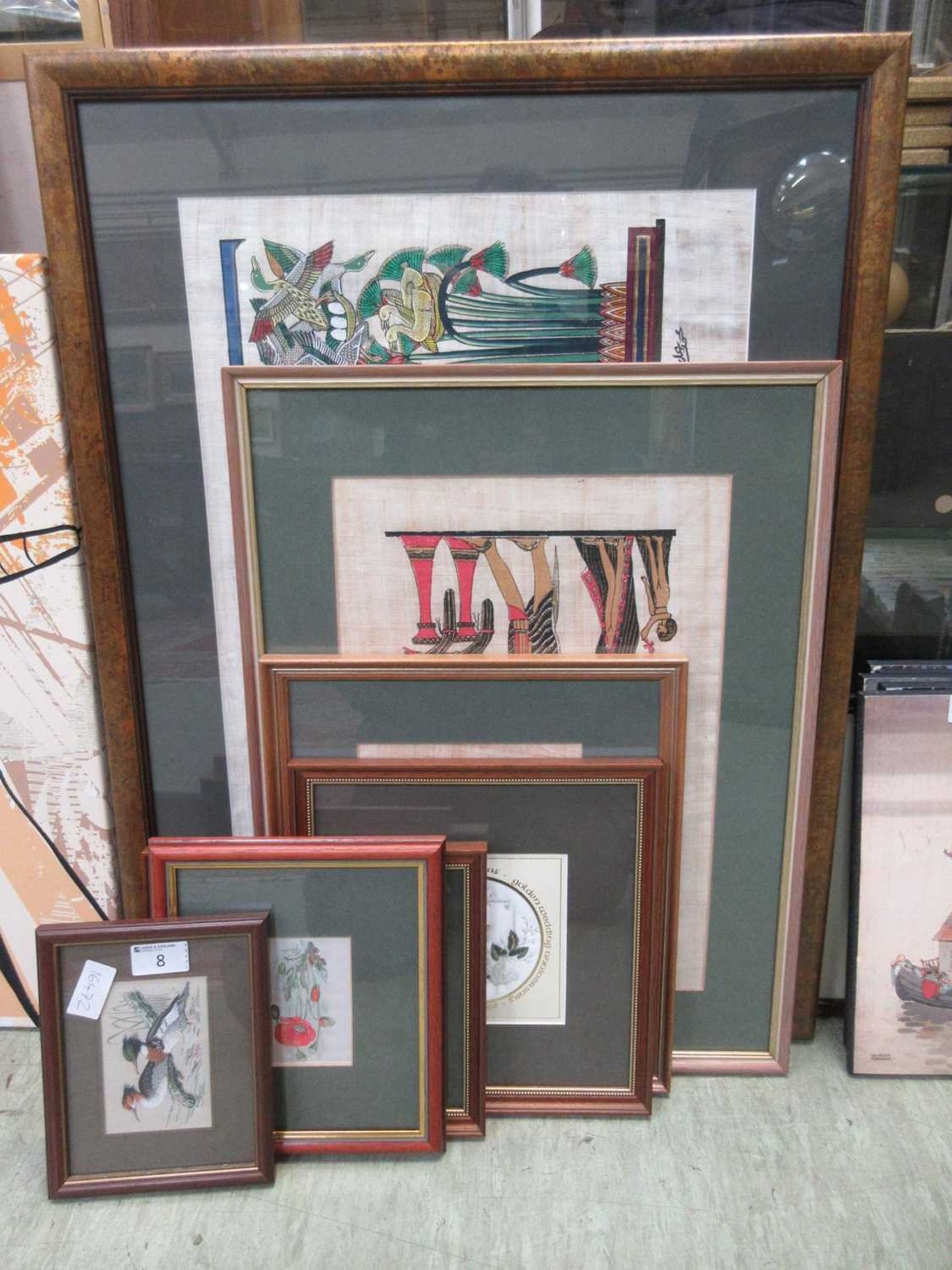 Artworks to include Cash's silks, Egyptian papyrus paintings, needlework, etc