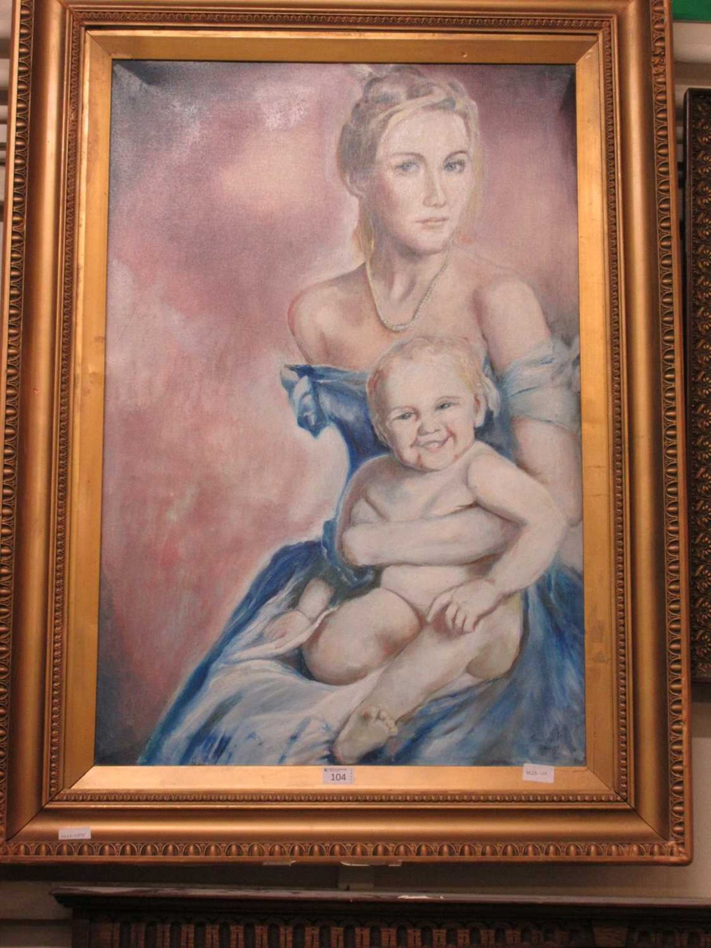 A gilt framed oil on canvas of mother and child signed Jennifer Ewart