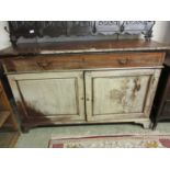 An early 20th century mahogany sideboard, the top over one long drawer and two cupboard doors with