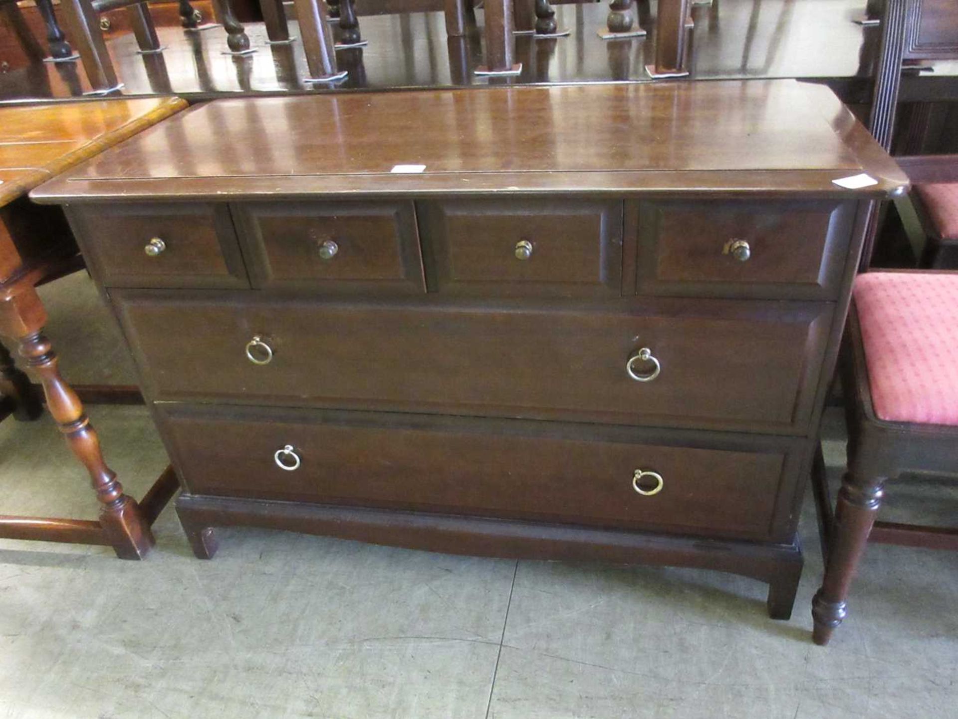 A Stag Minstrel chest of four short over two long drawers