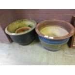 Two glazed garden pots along with one other