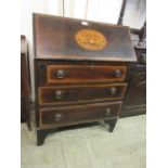 An early 20th century mahogany, strung, and marquetry bureau