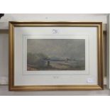 A framed and glazed watercolour of figure by beach scene after David Cox