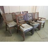 A set of six teak garden armchairs by Land Of Leather