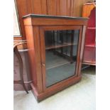 A Victorian rosewood and boxwood strung display cabinet with glazed door
