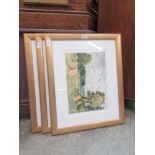 A set of three framed and glazed watercolours of countryside scenes