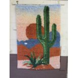 A woollen wall hanging artwork depicting cacti