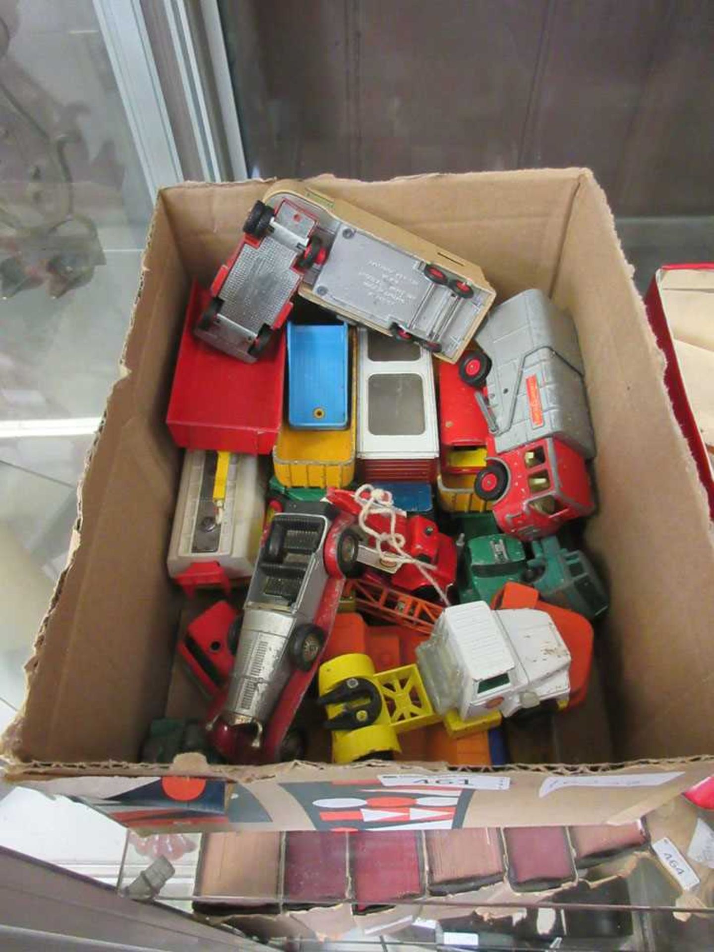 A box containing a quantity of die cast toys to include Lesney, Matchbox, etc