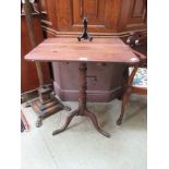 An 18th century oak tilt-top tripod table