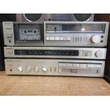 Three Sony hi-fi separates to include a tape deck, amplifier etc.