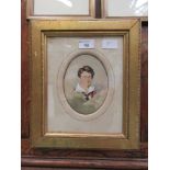 A framed and glazed watercolour of young gentleman's head