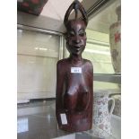 A carved African hardwood figure