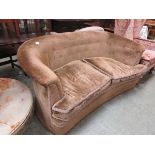 A 19th century two seat sofa upholstered in a cut button back fabric