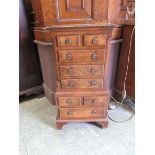A reproduction burr walnut miniature chest on chest