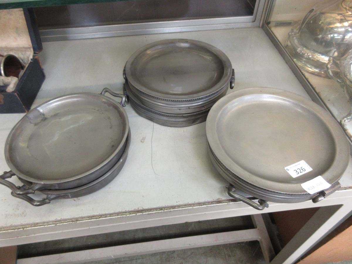 Six pewter plate warmers by James Dixon & Son