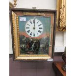 An early 20th century American wall clock with glass panel titled 'The Imperial'