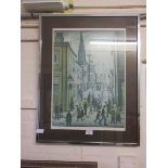 A framed and glazed Lowry print