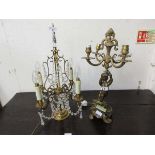 Two table lamps, one with putto column, the other cut glass and gilt metal
