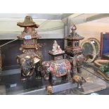 Four early 20th century ceramic models of elephants Heights: 40cm; 36cm; 26cm; 6cm