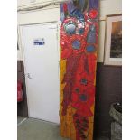 A 20th century ceramic tile artwork of abstract flowers, 225 cm x 59 cmDamage to one corner.