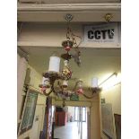 A ceramic and gilt metal ceiling hanging light