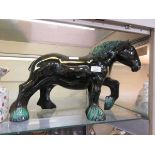 A ceramic figure of a horse