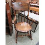 An early 20th century possibly American beech rocking chair