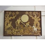 A framed eastern print on fabric of figures in woodland scene