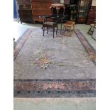 A large blue ground oriental style rug