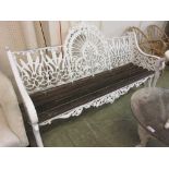 A reproduction Coalbrookdale style cast metal garden bench seat with slatted seat