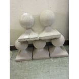 A set of five reconstituted stone globe pier finials