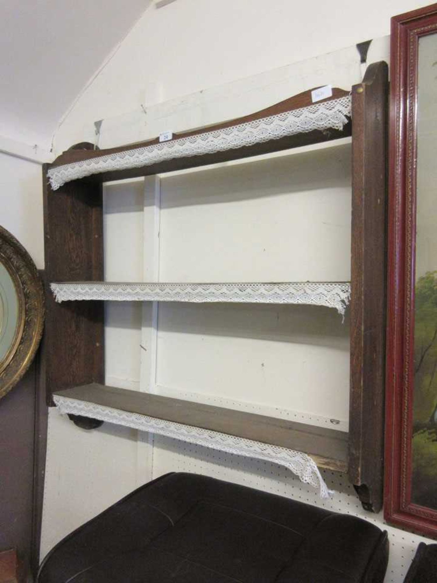 An early 20th century oak set of wall shelves