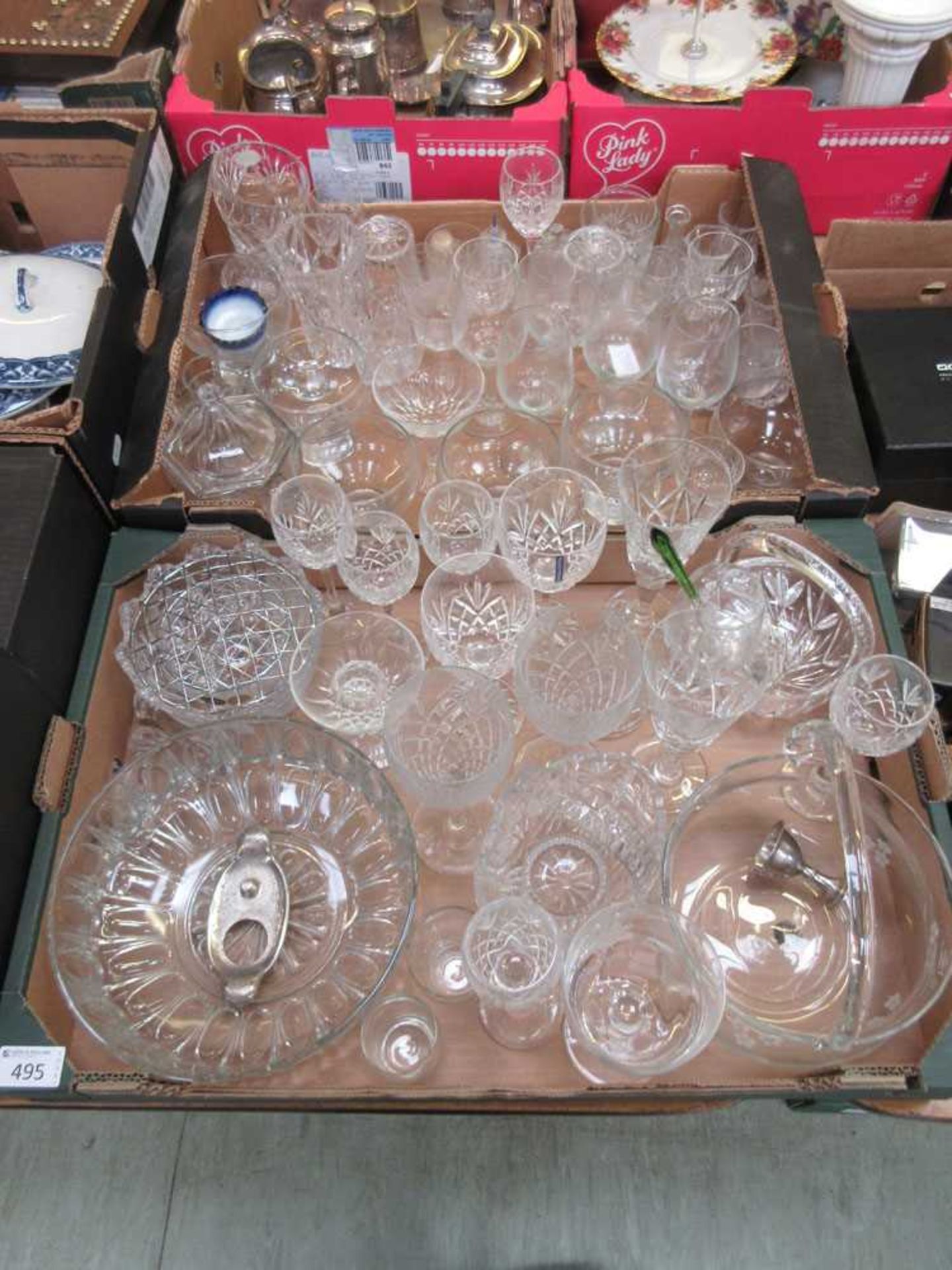 Two trays of glassware to include wine glasses. bowls etc.