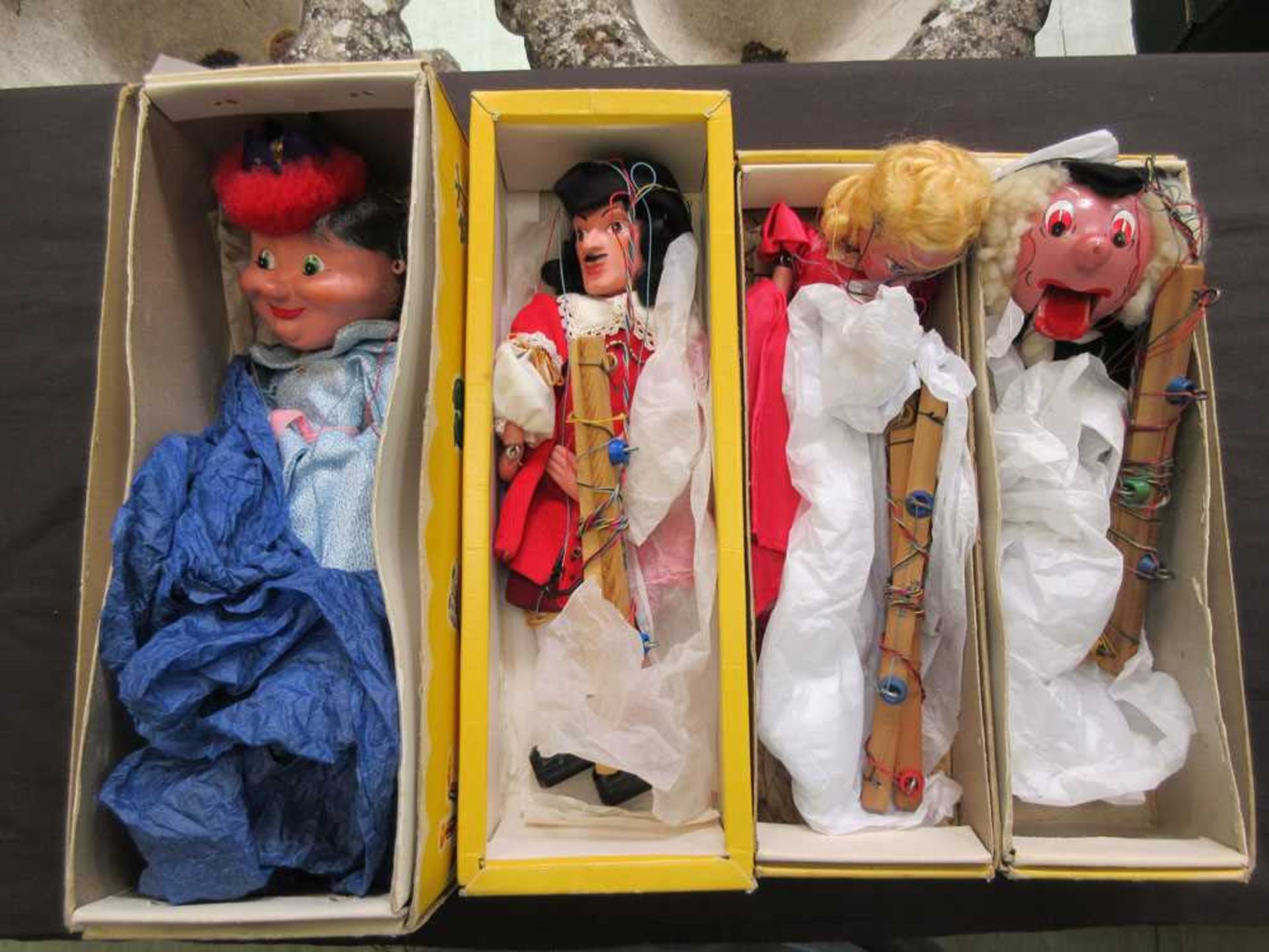 Four boxed Pelham Puppets to include 'Schoolmaster', 'King Charles I', 'Cathy Busby' and 'The Queen'