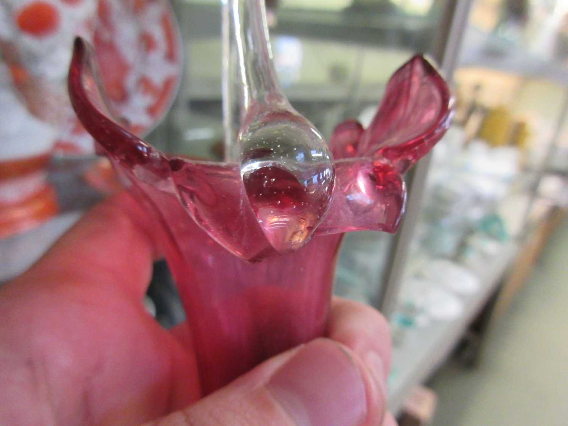 A cranberry glass epergne Multiple damages and repairs present, photos for reference available. - Image 6 of 6