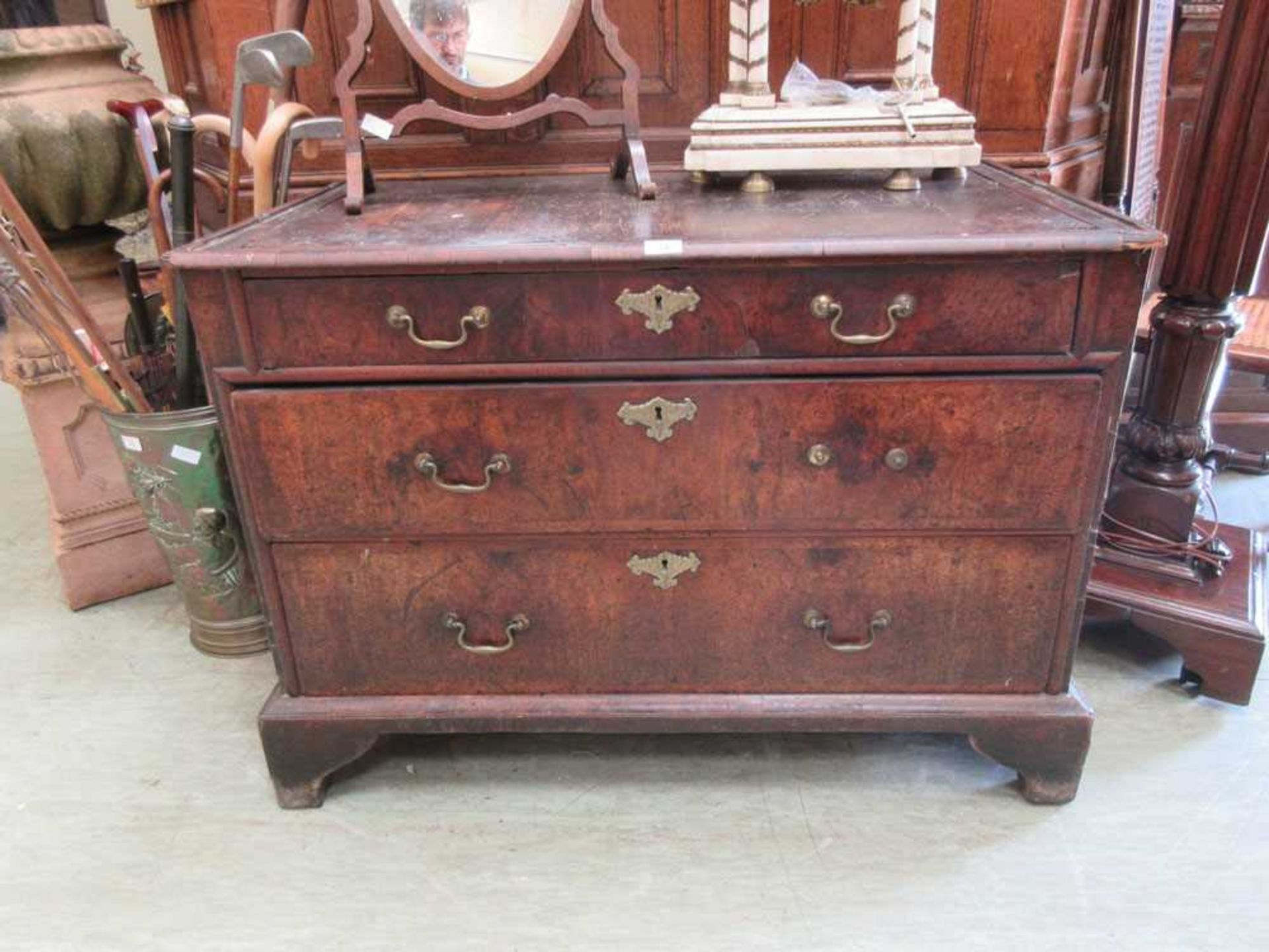 An 18th century walnut chest on chest base