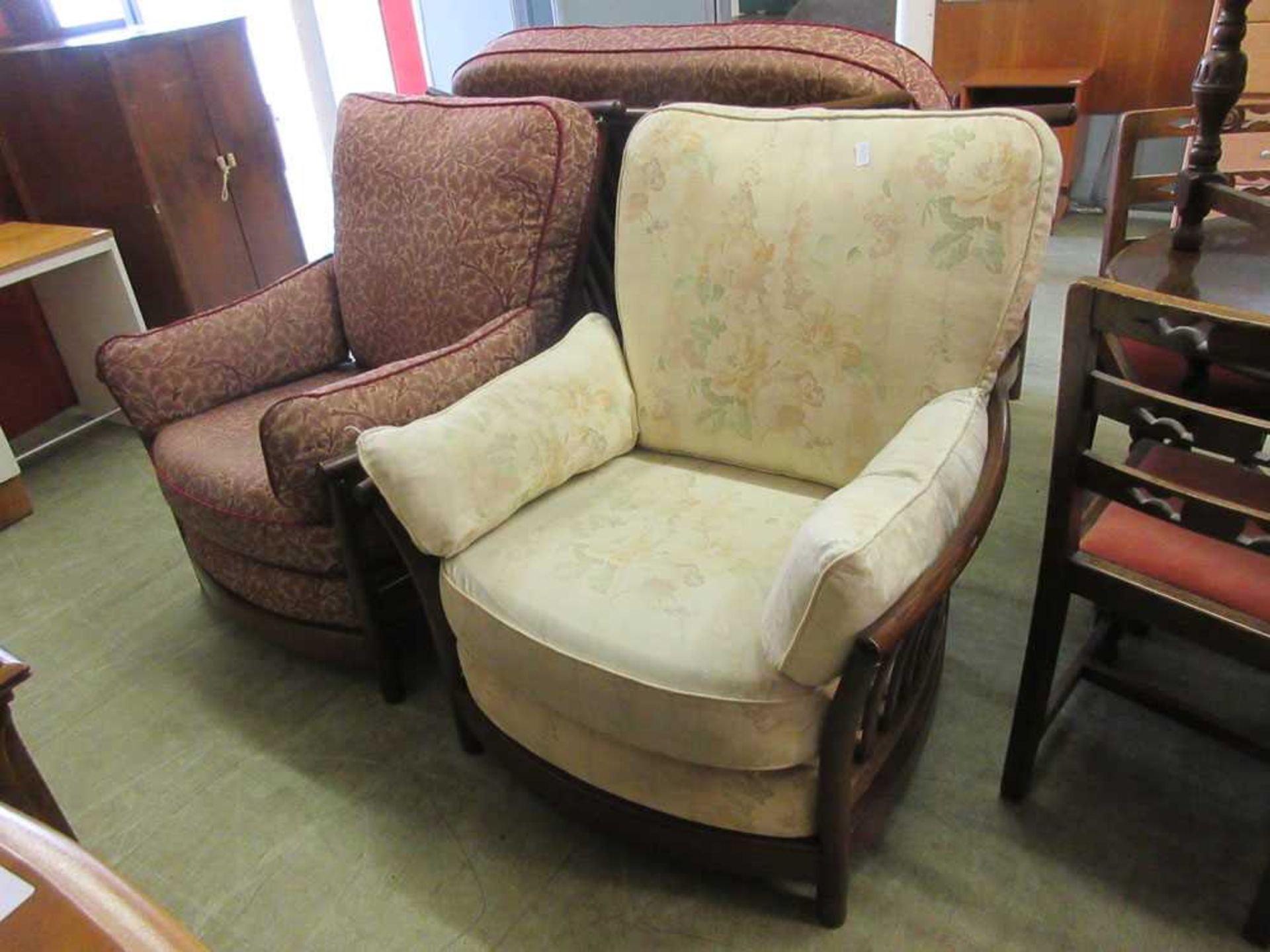 A pair of modern Ercol easy chairs