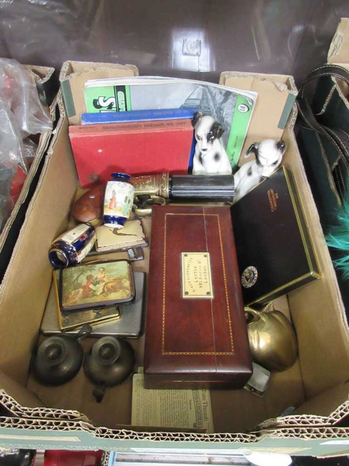 A box containing collector's items to include boxed hydrometer, card boxes, candlesticks, etc
