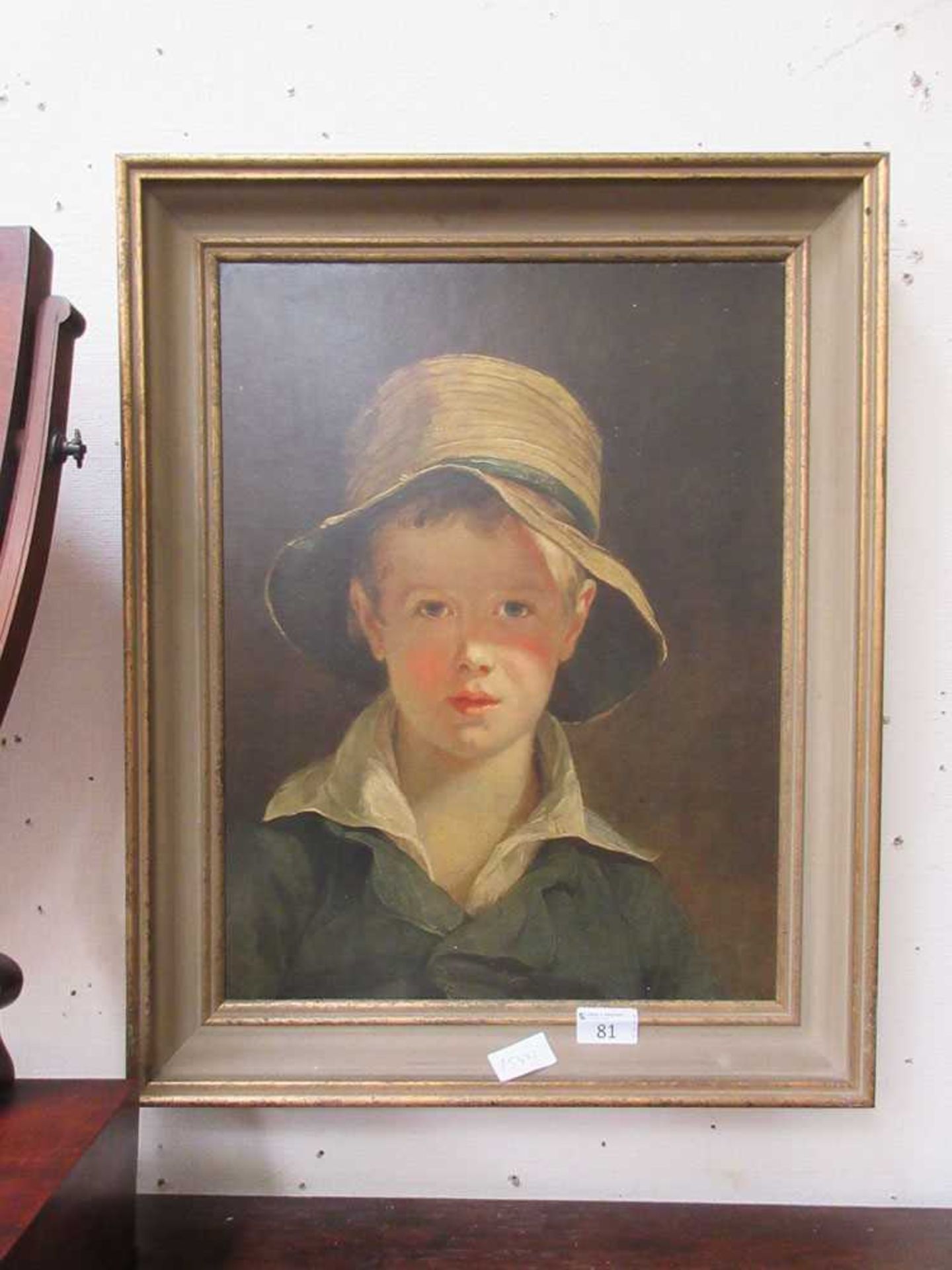 A parcel gilt framed print of young boy