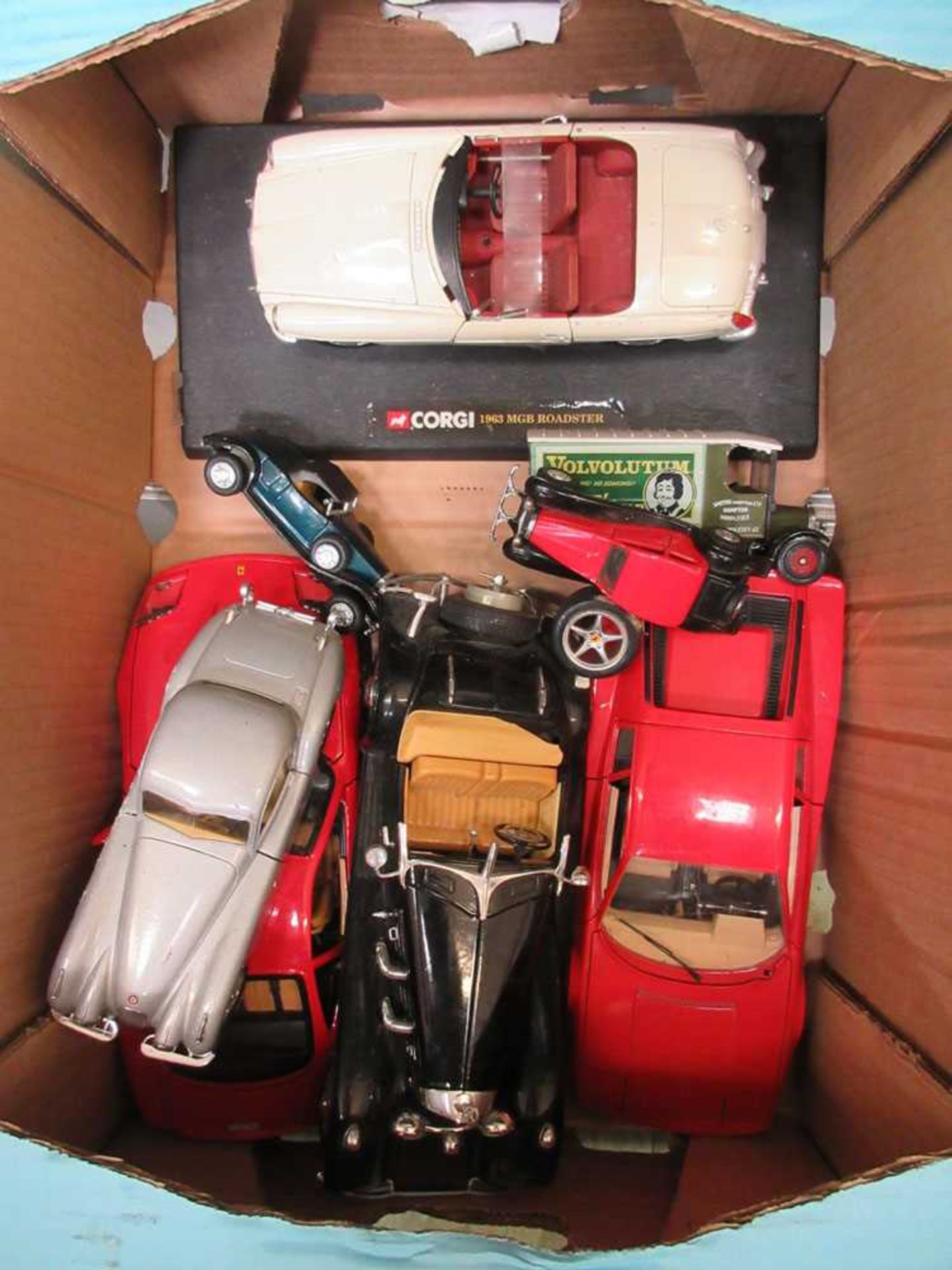 A box containing die cast models to include Burago, Corgi, etc (A/F)