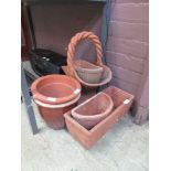 A collection of terracotta pots