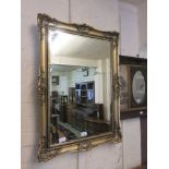 An ornamental glass mirror