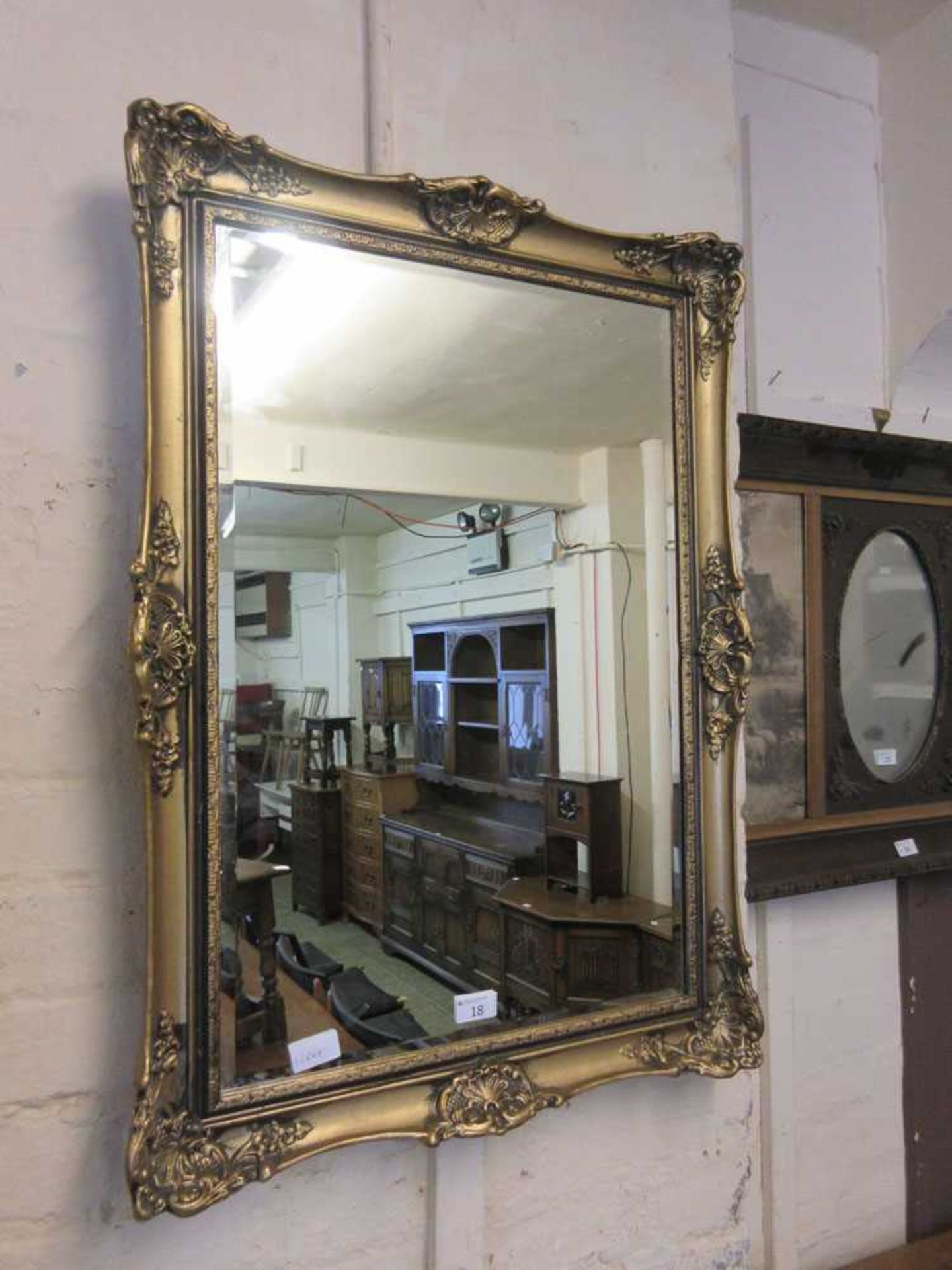 An ornamental glass mirror