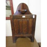 An early 20th century oak corner stick stand with linen fold panel