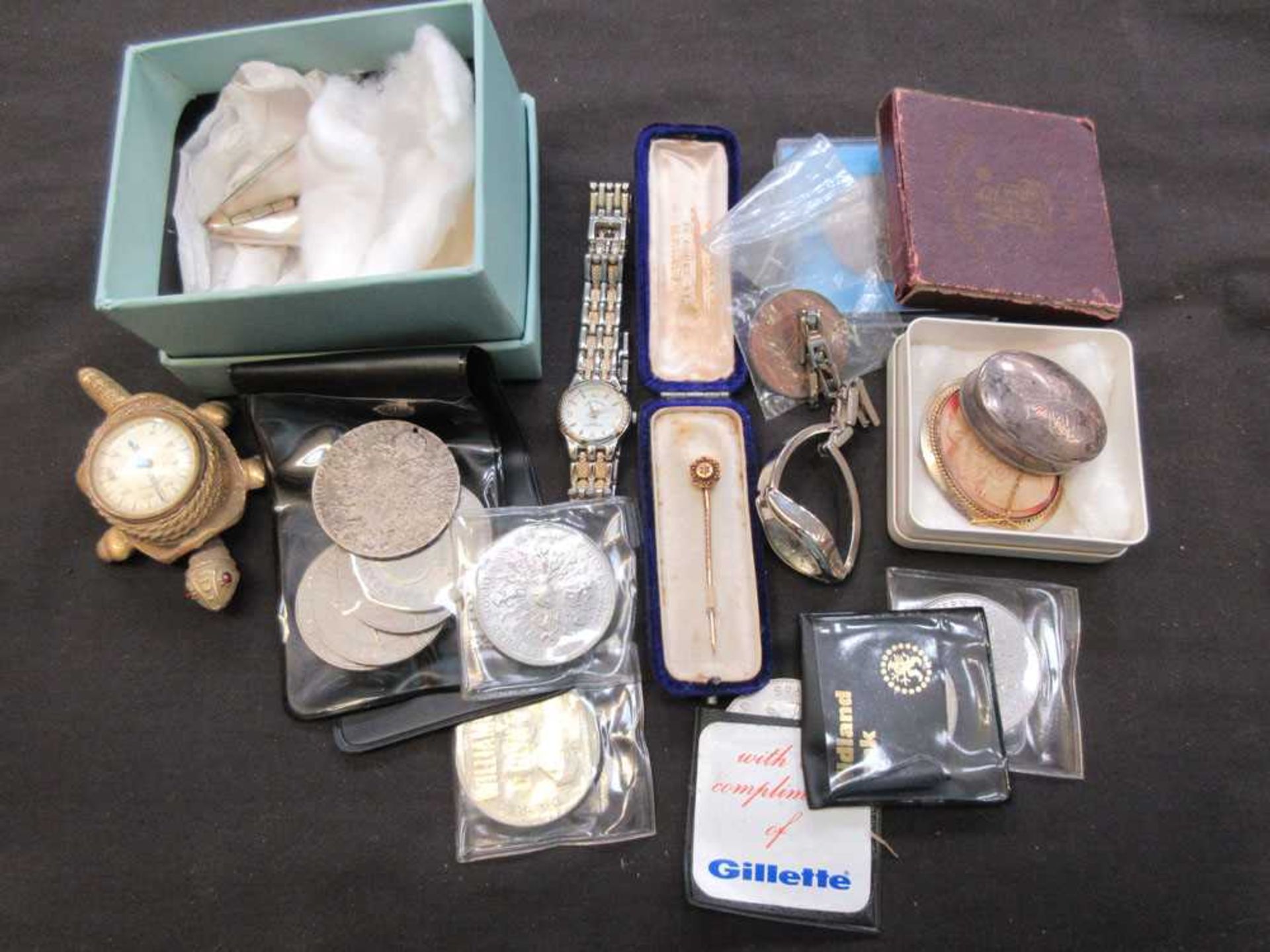 A bag containing assorted items to include wristwatches, coins, Festival Of Britain medal, etc