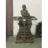 A cast iron umbrella/stick stand with plaque depicting William Wallace